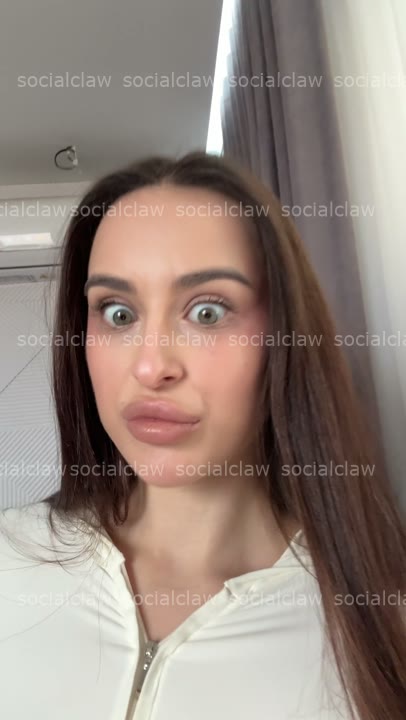 wide-eyed hand-over-mouth surprise