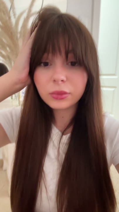 casual hair-touch talking vibe