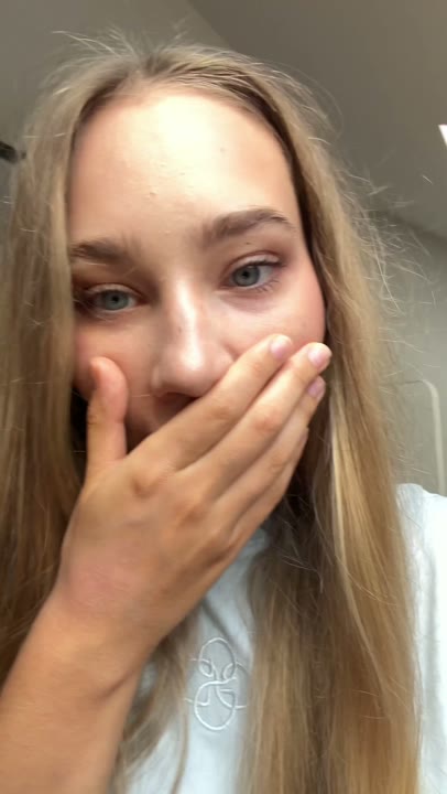 surprised then warm happy smile